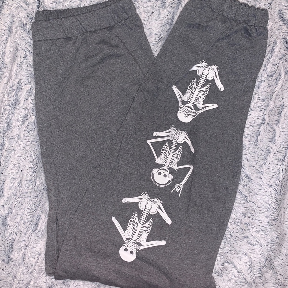Gray sweatpants size medium with skeleton design
